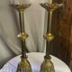 Pair of candlesticks in bronze and brass