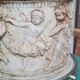 Round white stone pot cover with a farandole of angels