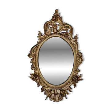 Large oval gold mirror, Louis XV rococo style, late 19th century, 114 x 66 cm.
