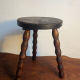 Round wooden tripod stool