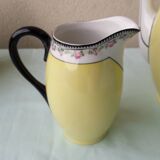 Coffee pot or teapot, sugar bowl and milk jug in porcelain.