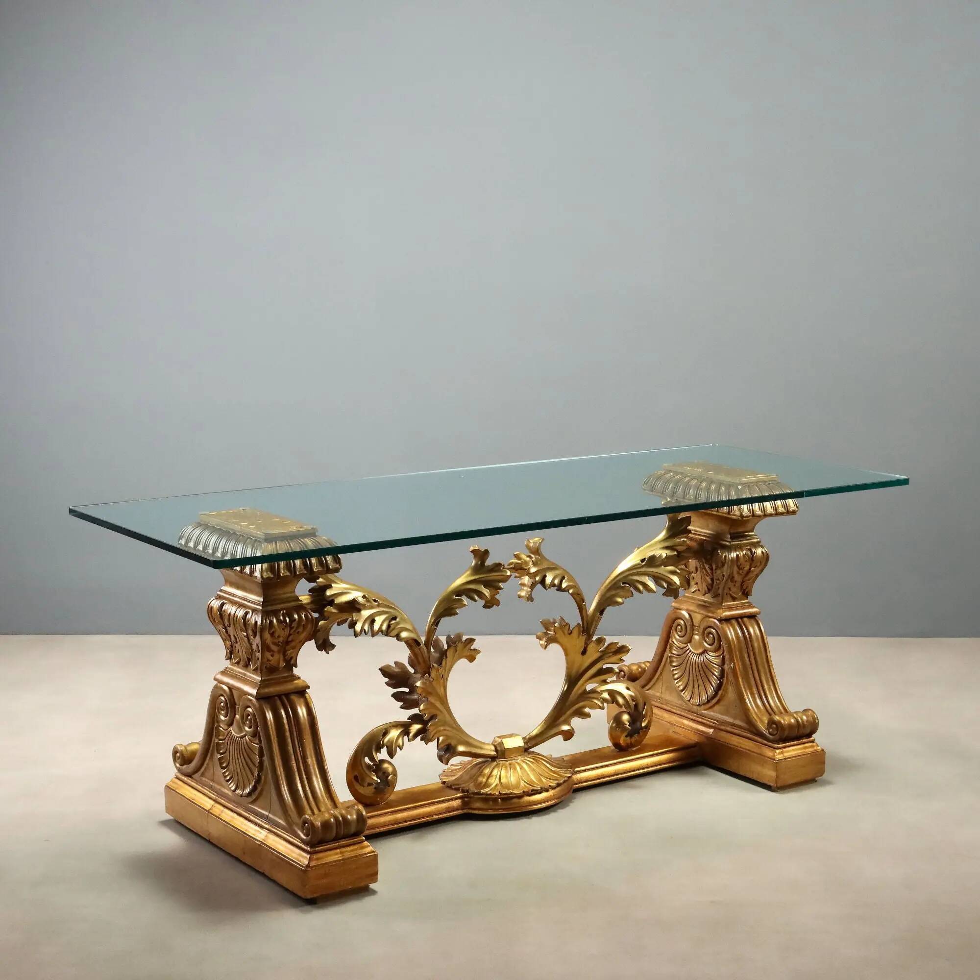Antique coffee table in gilded wood with a glass top, Italy, 20th century.