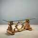 Antique coffee table in gilded wood with a glass top, Italy, 20th century.