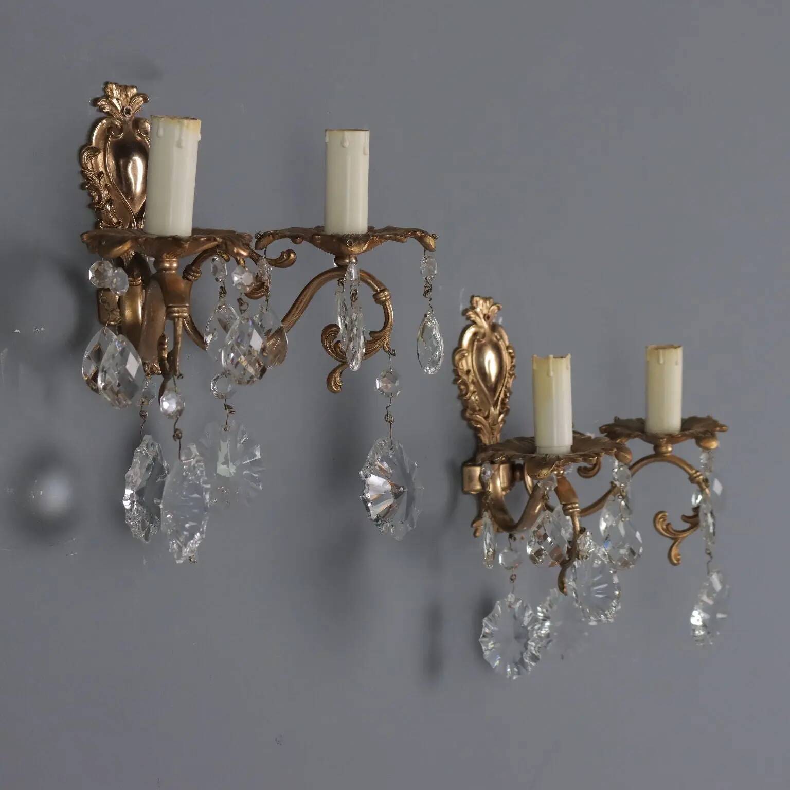 Antique wall sconces in Rococo style, bronze, Italy, 20th century.