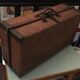 Braided straw suitcase