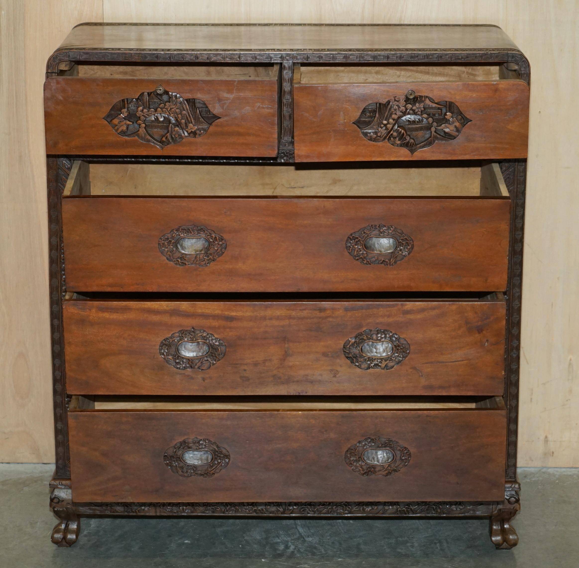 Antique Chinese commode hand-carved circa 1890 with detailed handles.