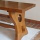 Solid wood dining table, sculpted brutalist base, 1960s.