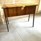 Vintage 1950s sewing machine with blonde oak veneer.