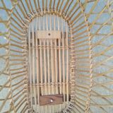 Rattan cradle for doll on vintage wheels