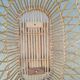 Rattan cradle for doll on vintage wheels