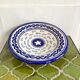 Decorative ceramic deep plate with fish decoration