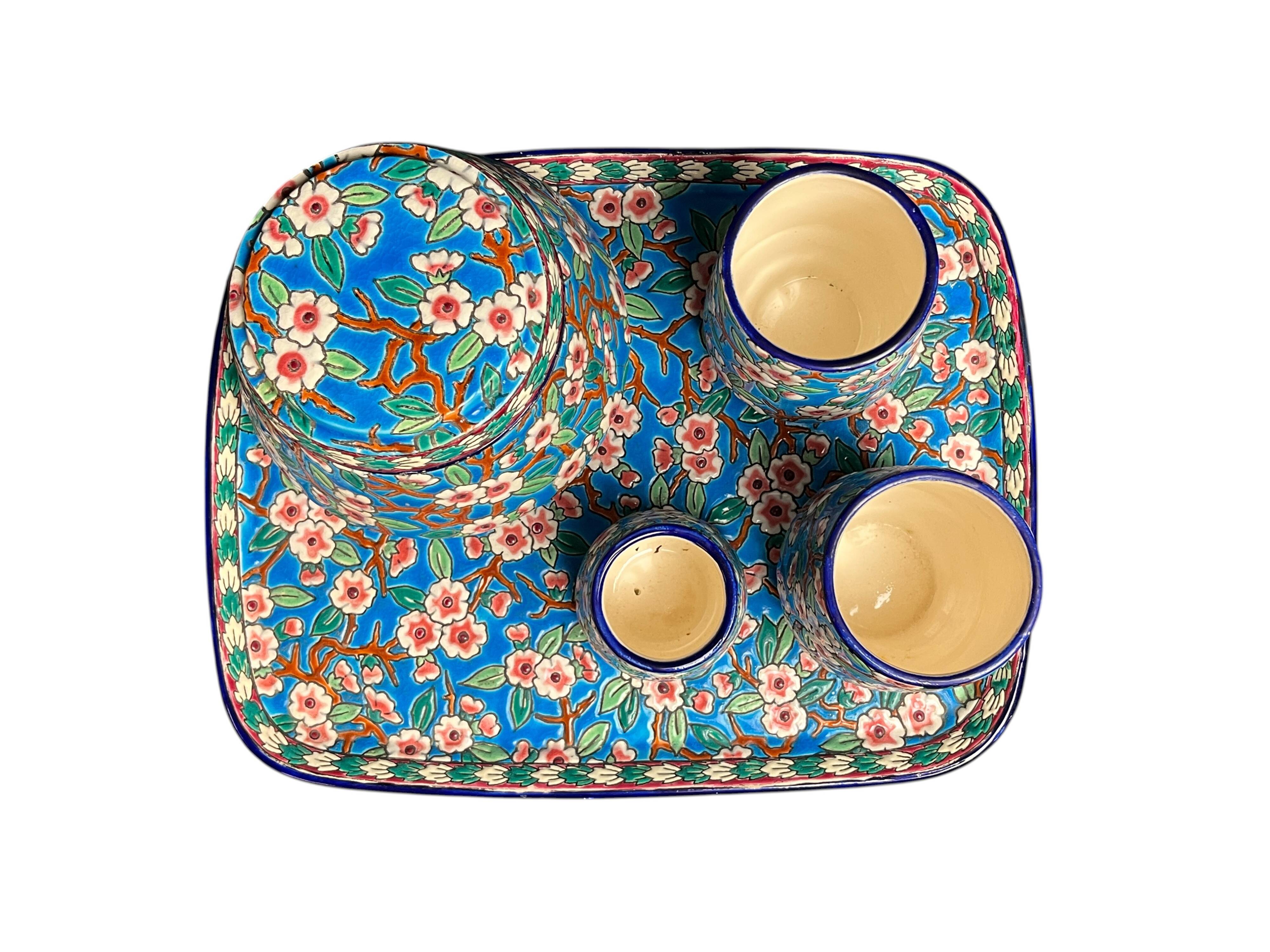Longwy, cherry blossom glazed earthenware smoking set, early 20th century