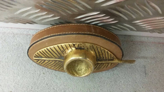 Copper candlestick and leather