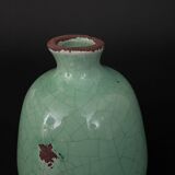 Vase en céramique craquelée XXe fond vert