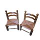 Pair of low fireplace chairs in turned wood and straw, Charles style.