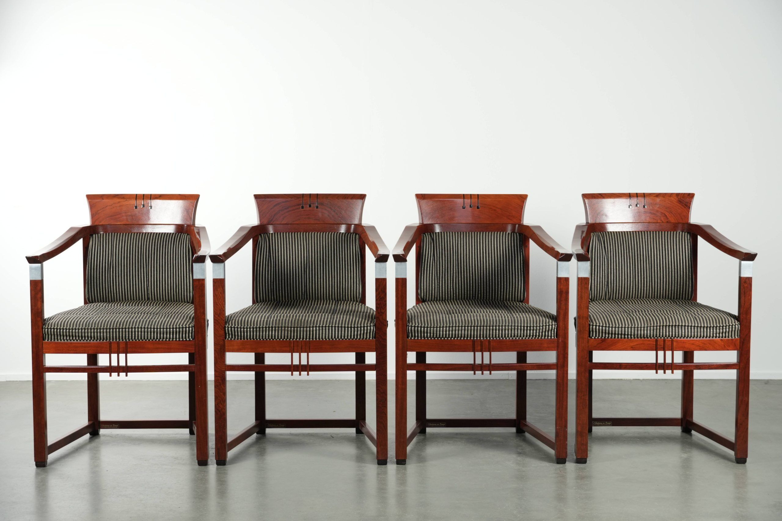 Set of 4 fabric dining chairs with armrests in good condition