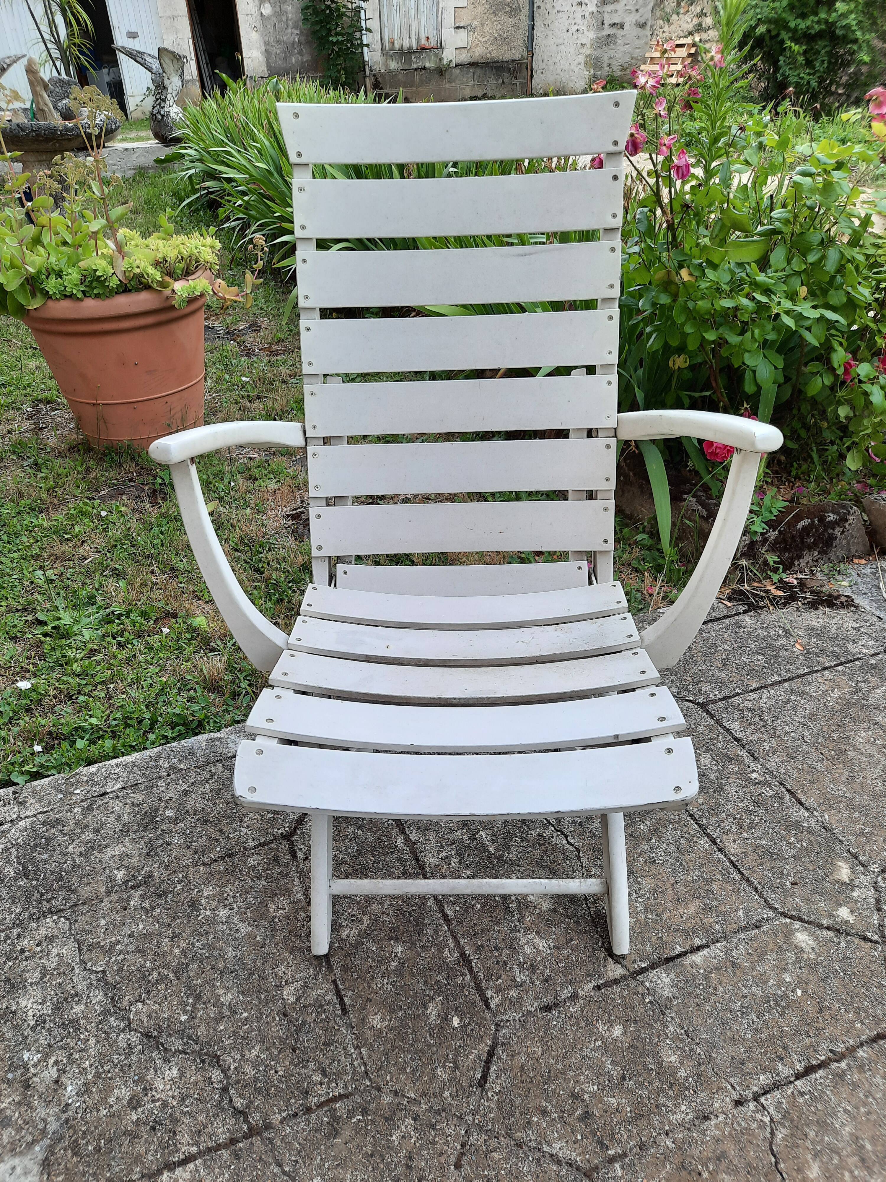 Pair of wooden garden armchairs