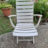 Pair of wooden garden armchairs