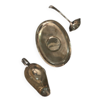 Saucer with silver spoon