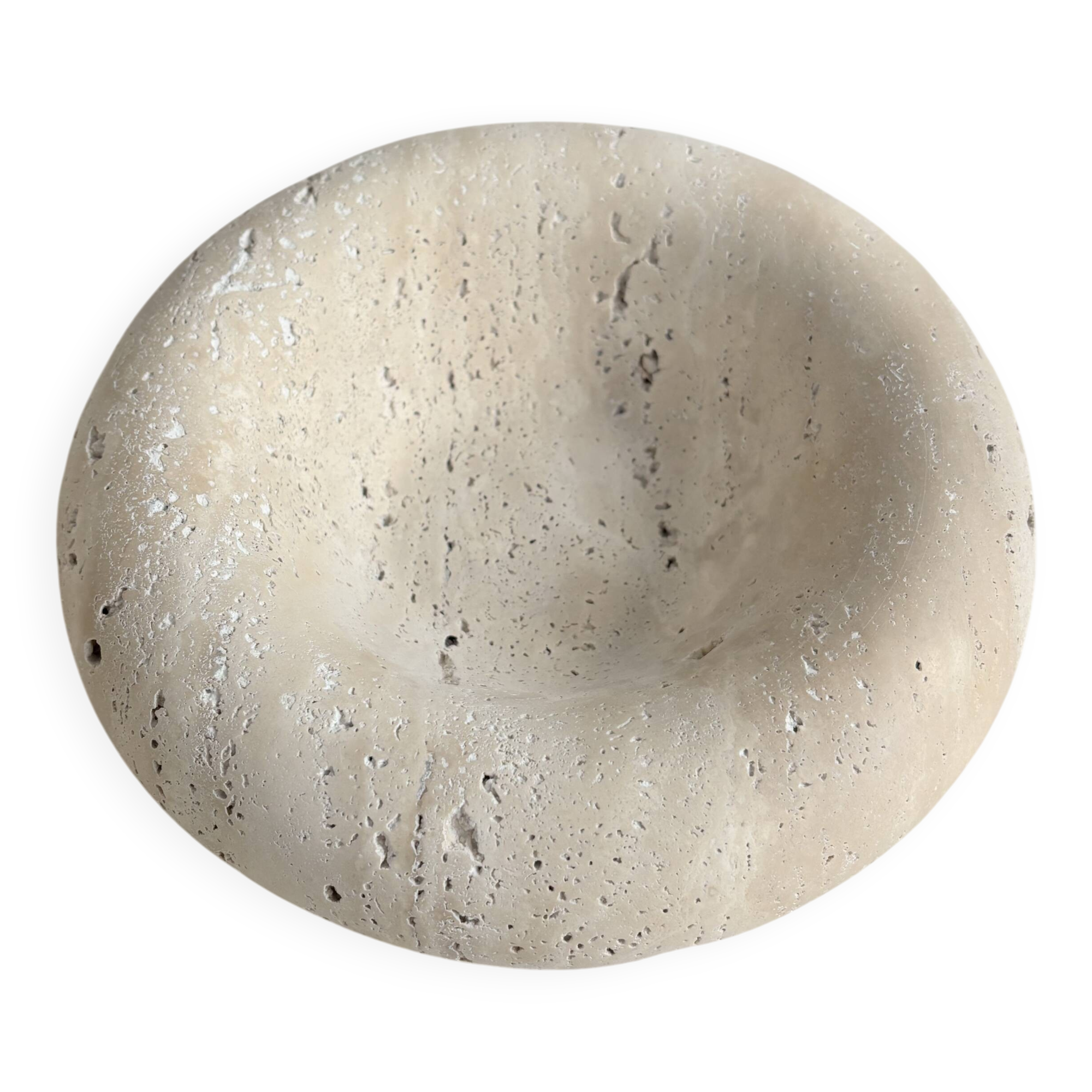 Travertine donut-shaped pocket emptier