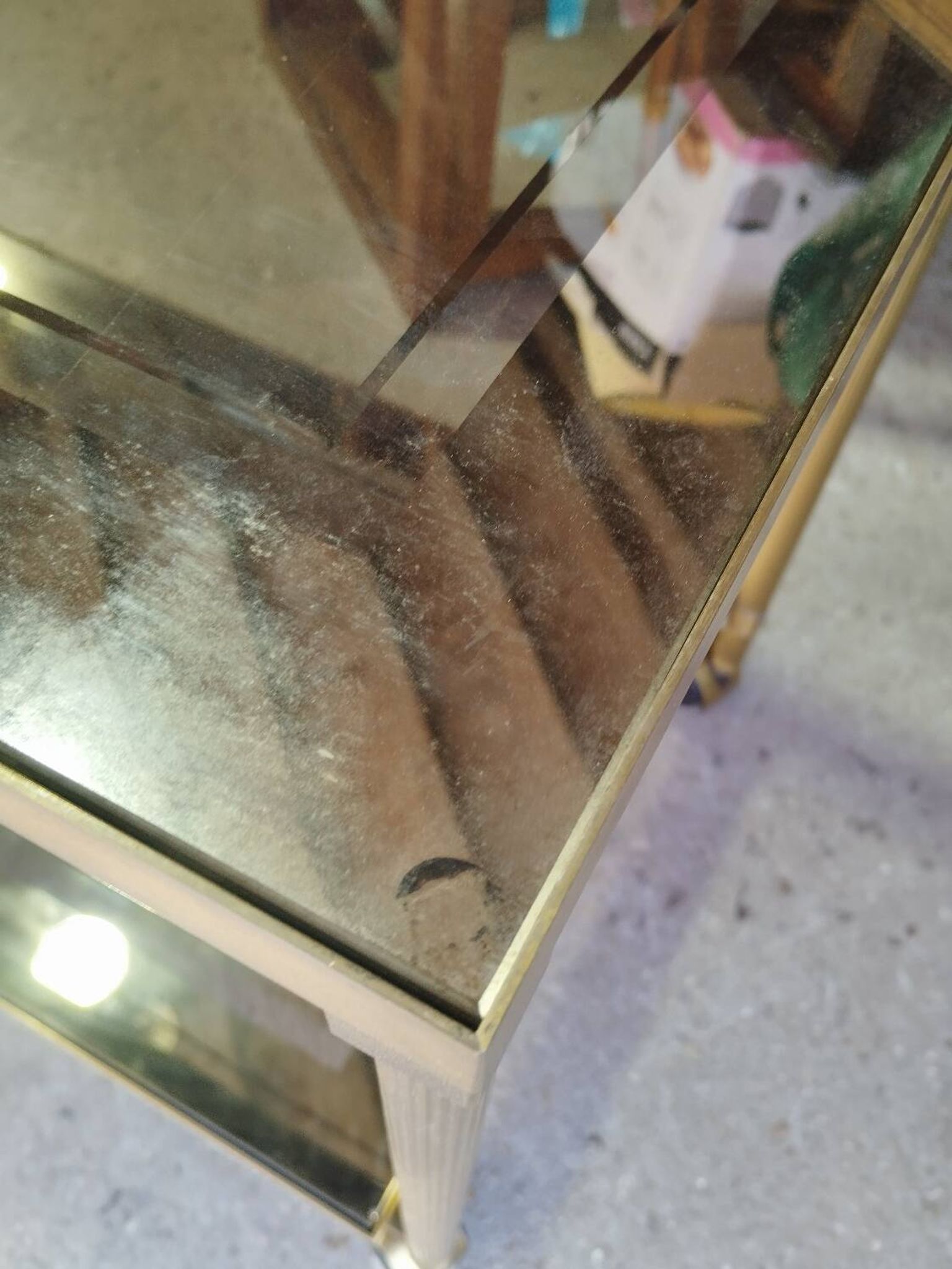 Vintage golden metal rolling dessert trolley
