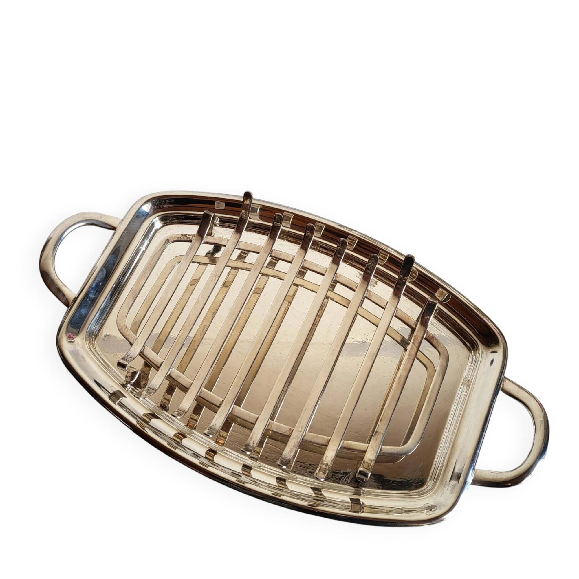 Silver-plated serving dish Quist and its asparagus cradle grid.