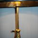 Black metal lamp and brass dore reglable tripod