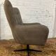 Swivel armchair in velvet fabric and metal