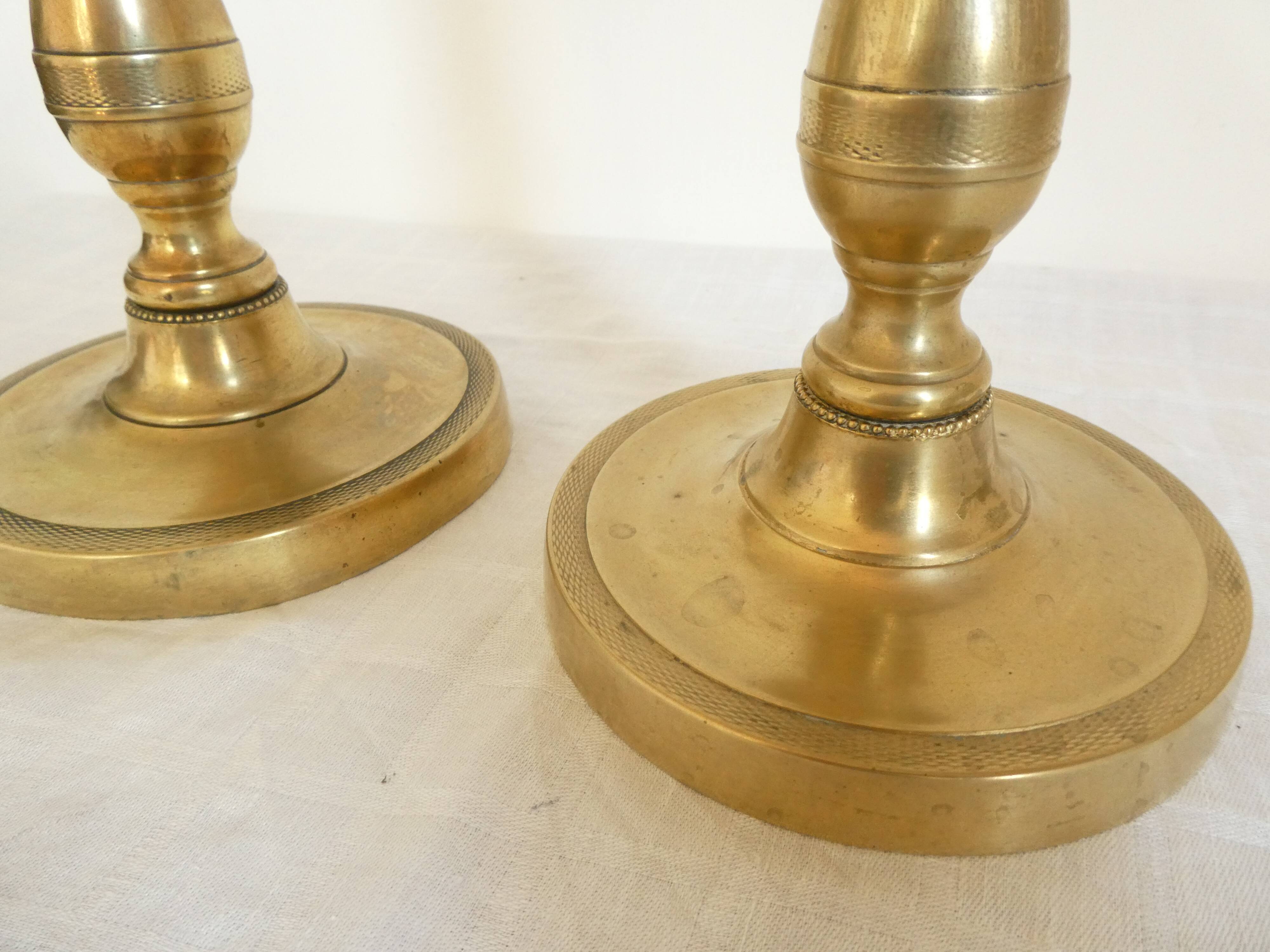 Pair of bronze candlesticks from the Restoration period, circa 1820