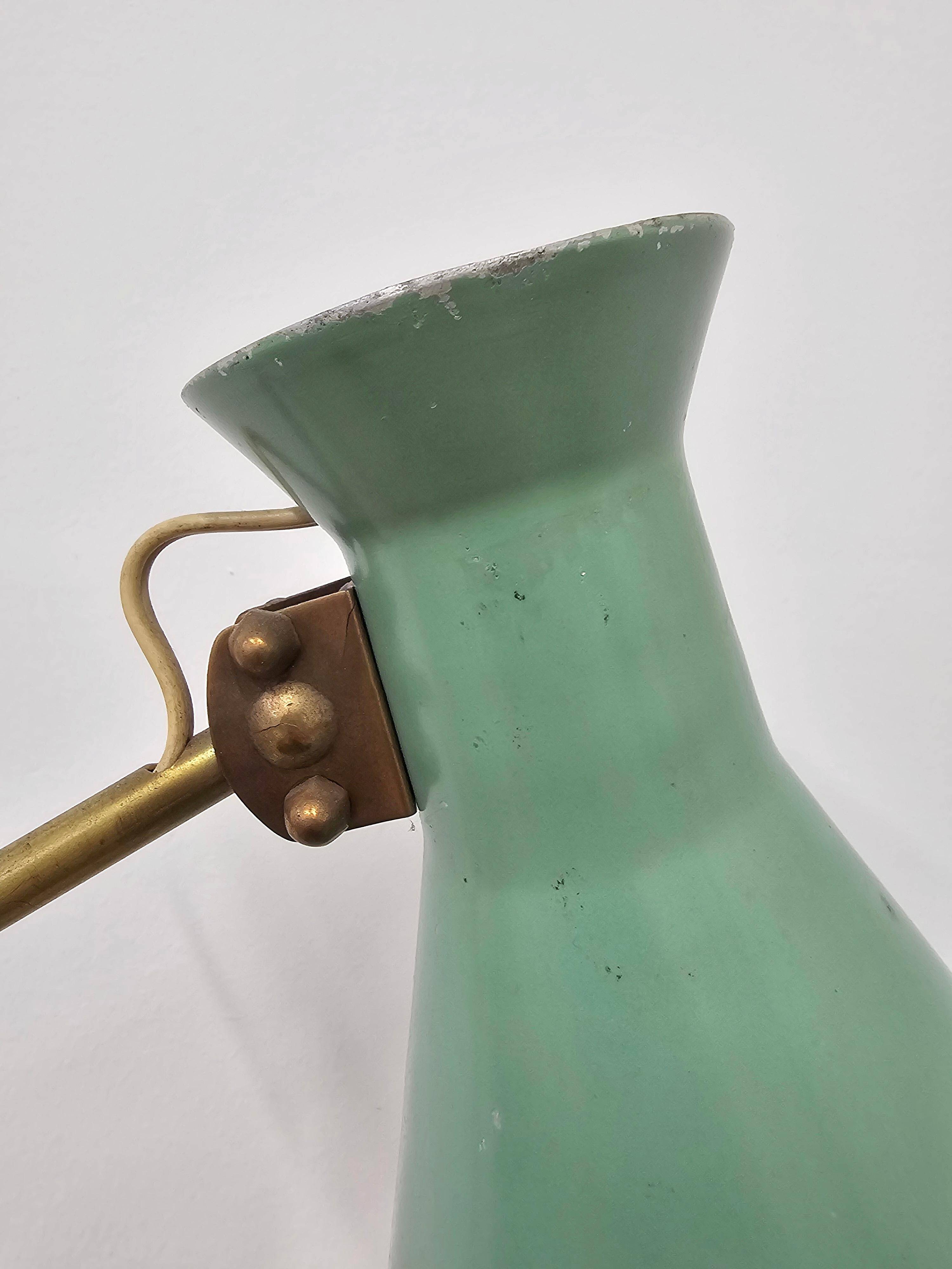 Mid-Century table lamp with a conical metal shade, attributed to Stilnovo.