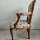 Fauteuil cabriolet de style Louis XVI garniture tapisserie fleurie