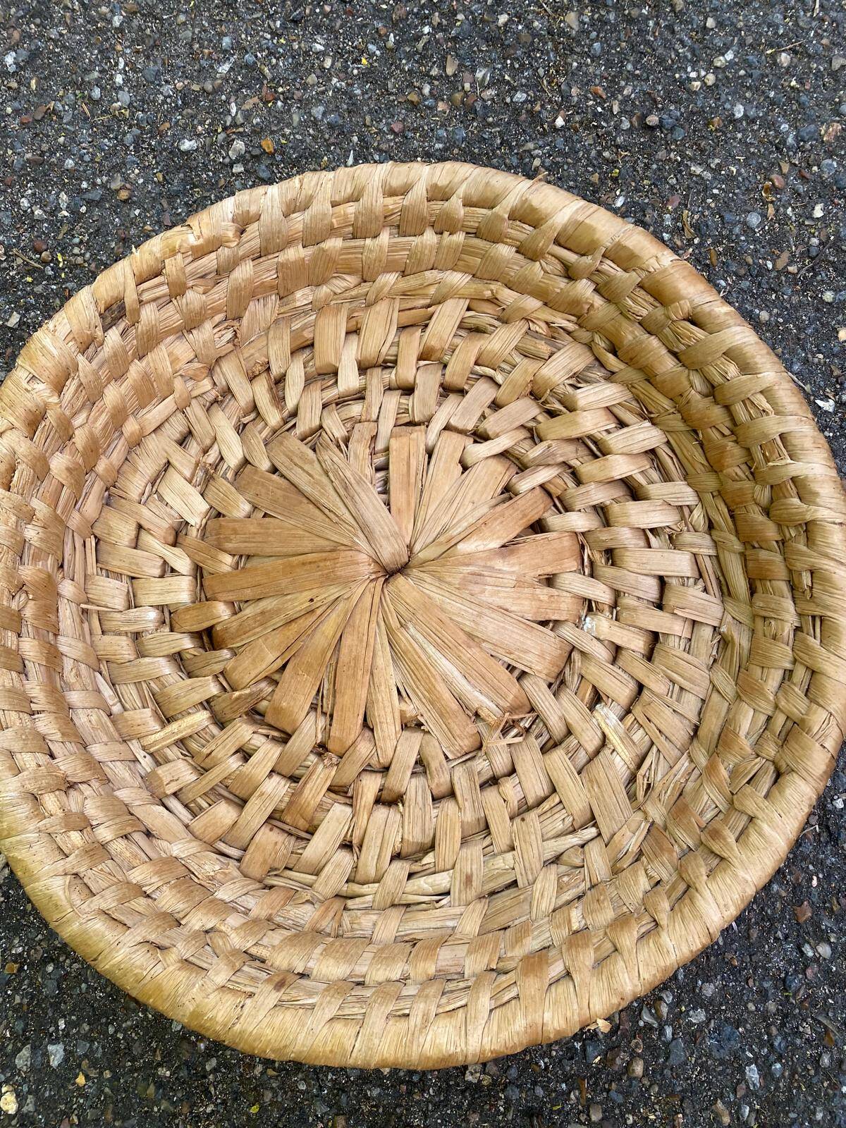 Round basket woven from banana fibre.