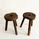 Pair of tripod farmhouse stools with clover pattern
