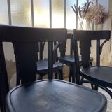Set of 7 black bistro chairs