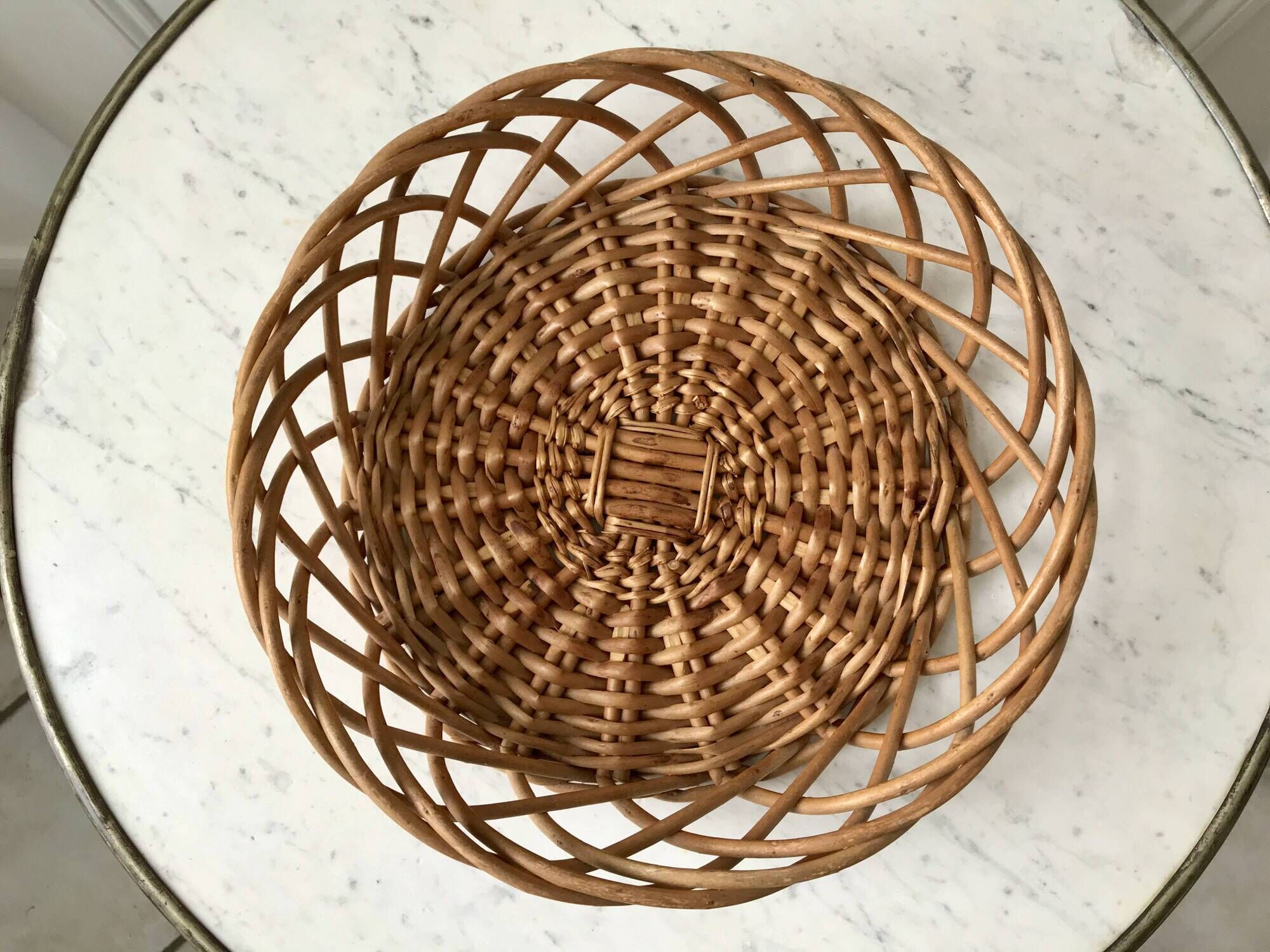 trio of woven rattan and bamboo baskets from the 60s and 70s