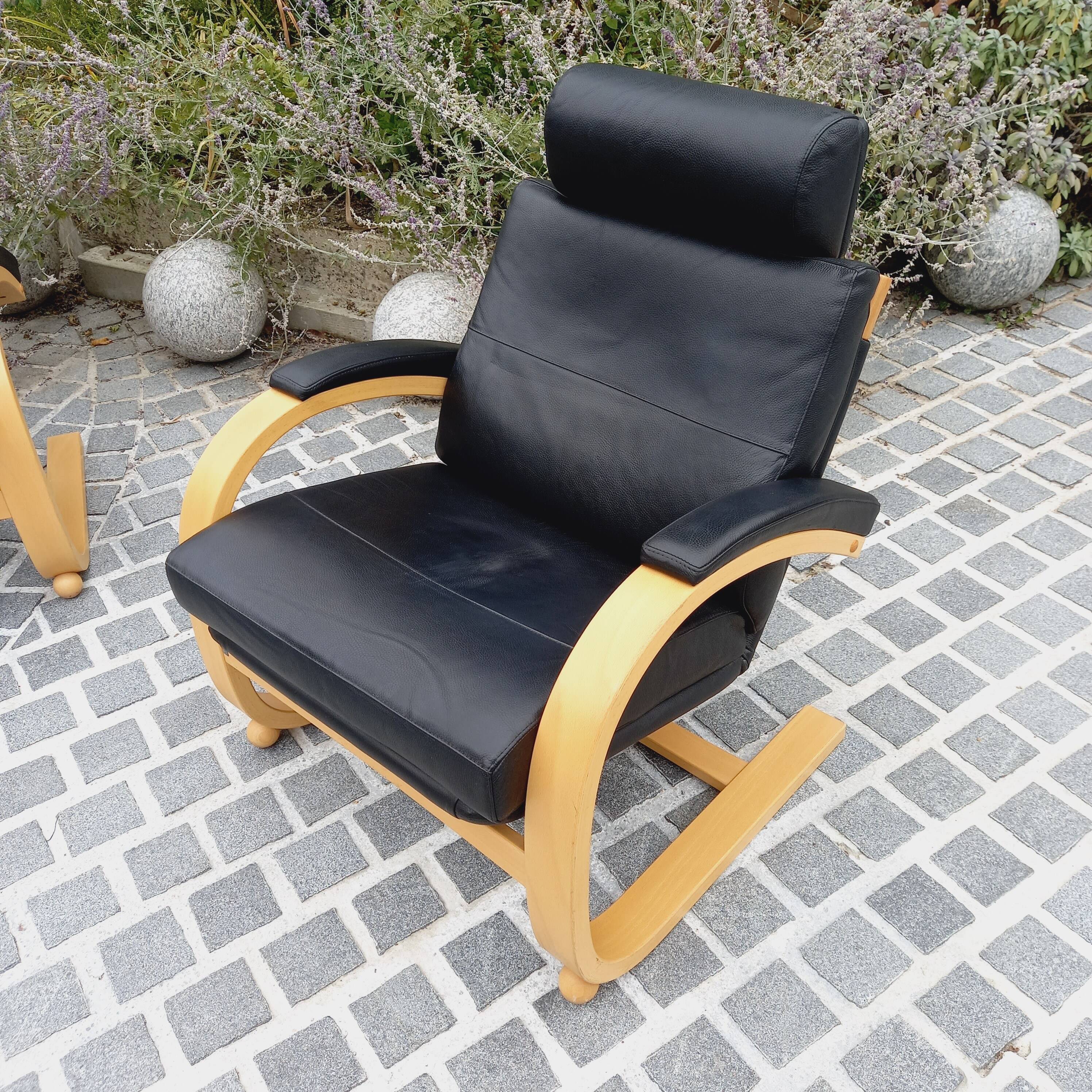Pair of NELO Scandinavian armchairs