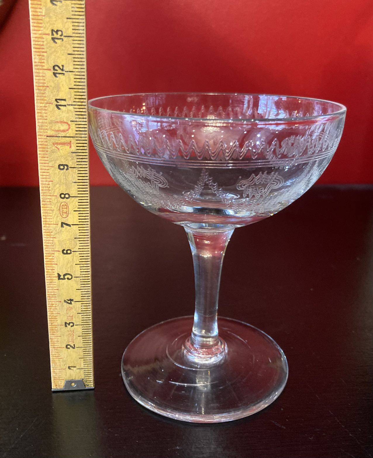 Early 20th century champagne glass burst by hand