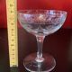 Early 20th century champagne glass burst by hand