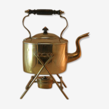 Old kettle with copper stove