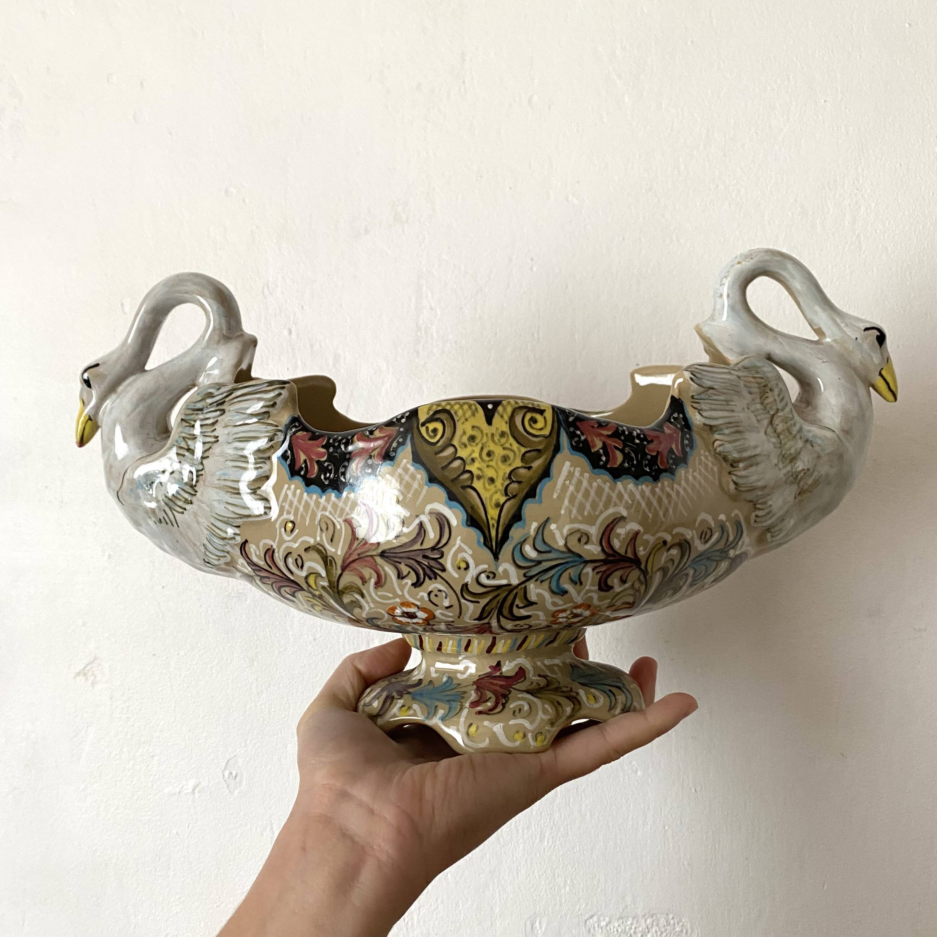 Molaroni planter, Pesaro, Italy, swans