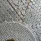 Grey ceramic mosaic top coffee table with dark wood base and brass accents, 1970s