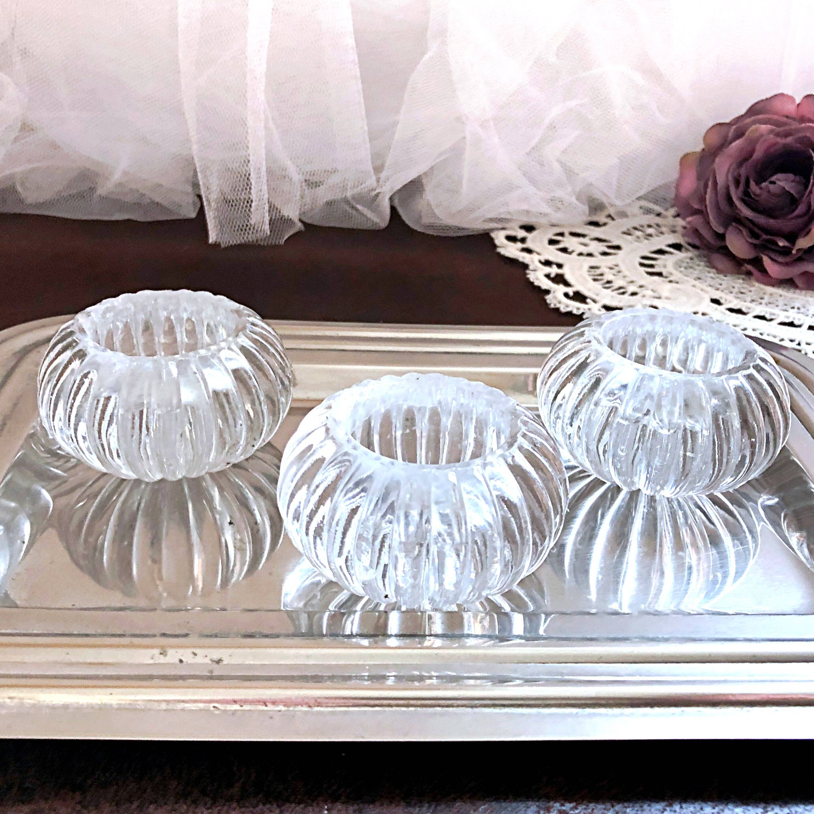 Trio of salt shakers, pepper shakers, molded glass salt shakers