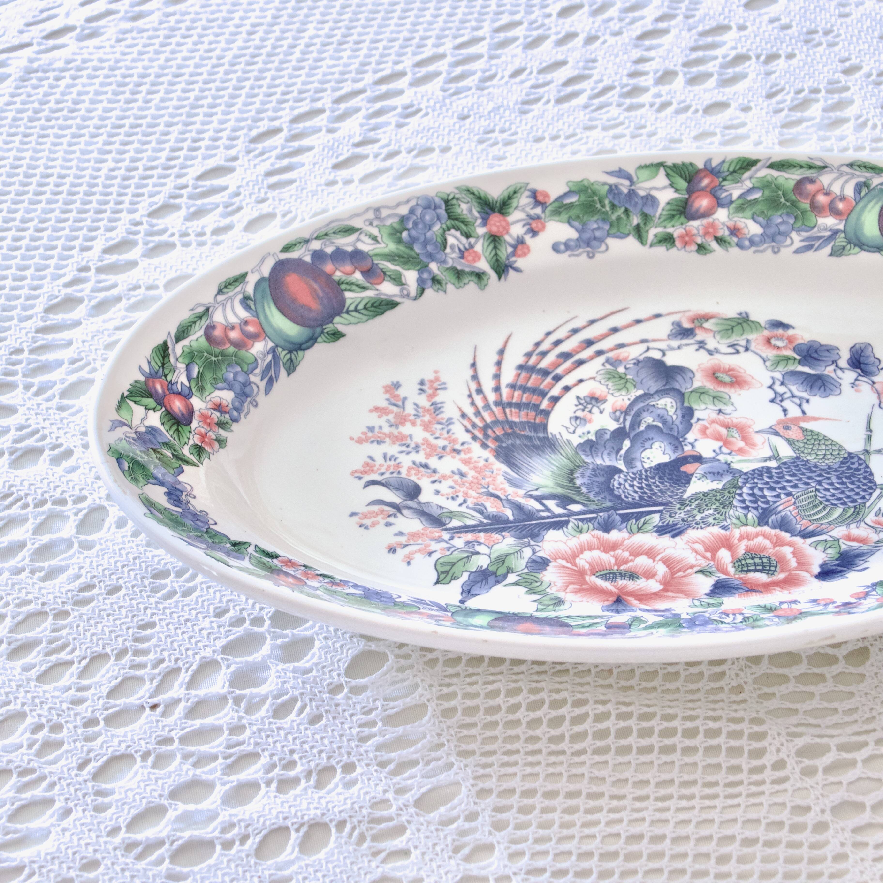 Large vintage Italian oval dish decorated with birds, flowers and fruits