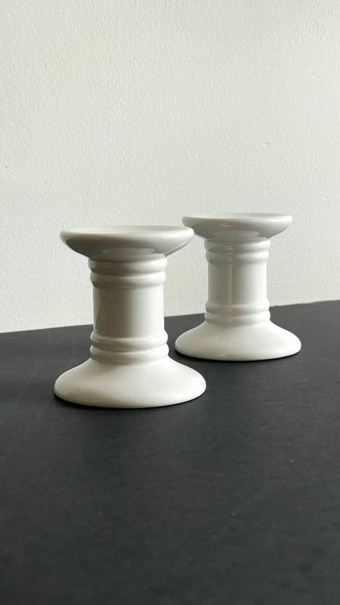 Pair of White Ceramic Candlesticks
