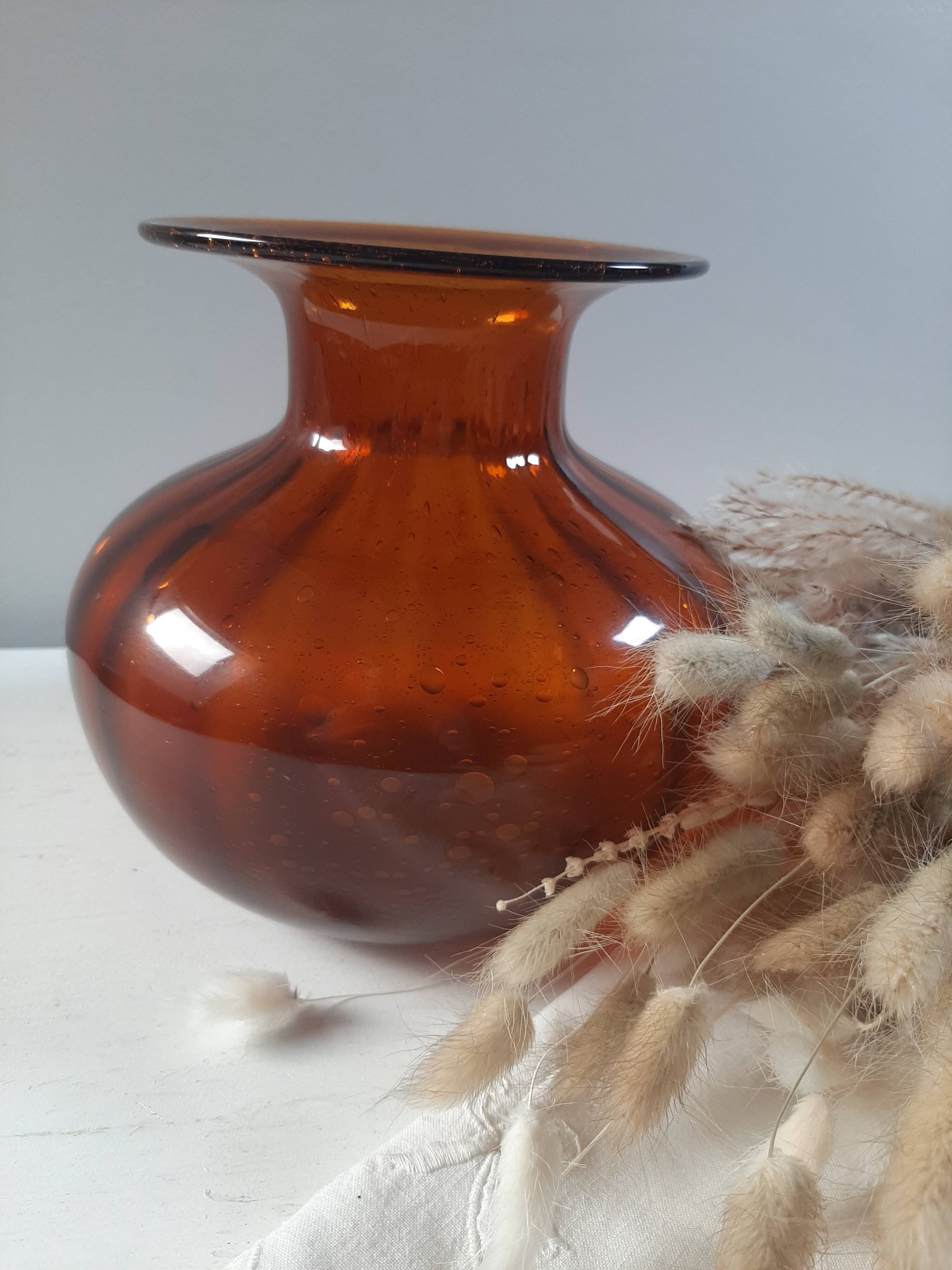 Orange vase in bubbled glass