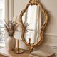Miroir rocaille en bois doré style Louis XV