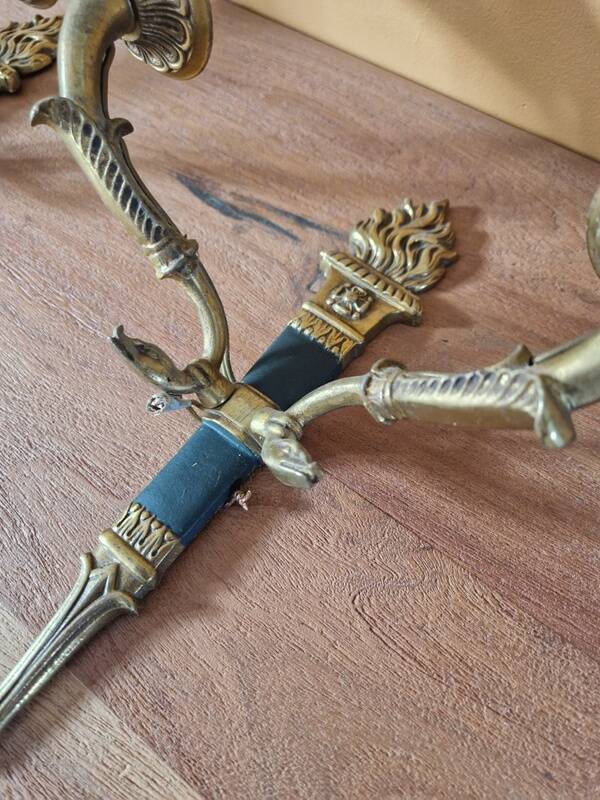 Pair of Empire style wall sconces in gilded bronze and green lacquer.