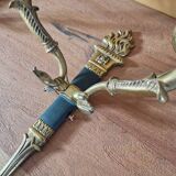 Pair of Empire style wall sconces in gilded bronze and green lacquer.