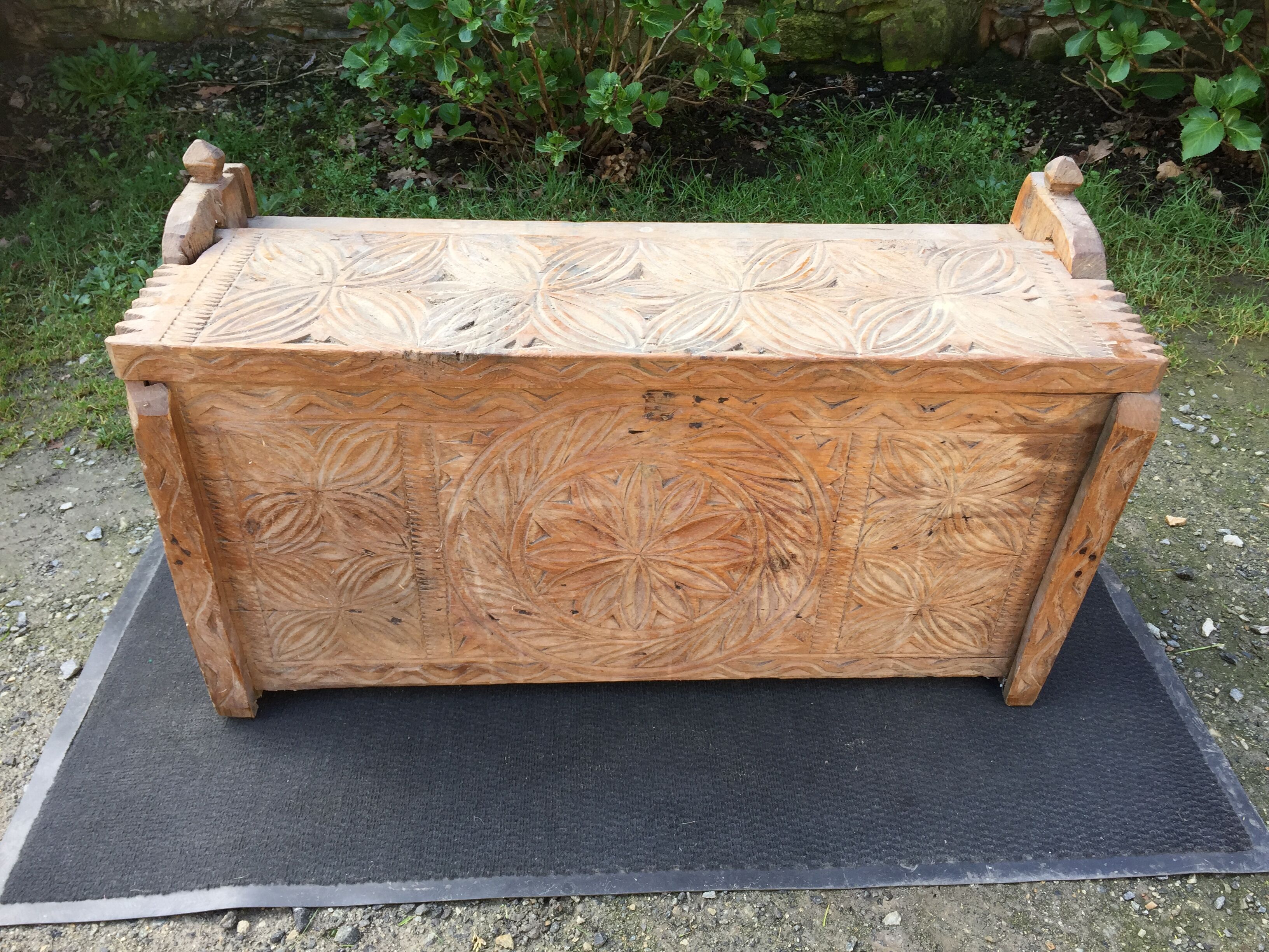 Ancient brutalist chest carved wind rose