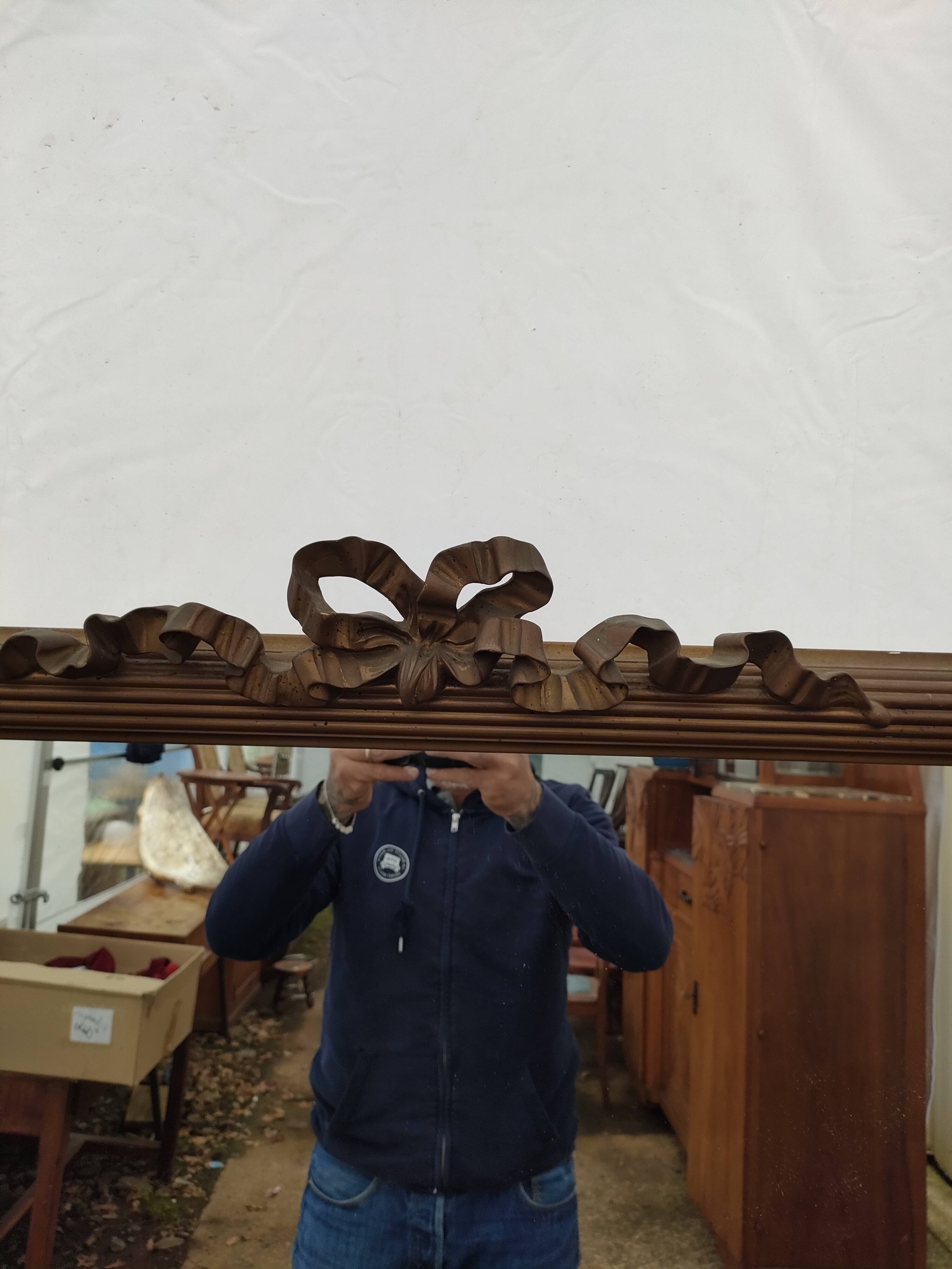 Antique mirror in gilded wood, 105x166 cm